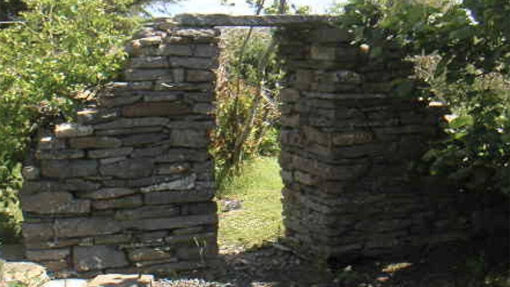 Photo by Peter Wynne of a dry stone wall entrance way between gardens by Peter Wynne in the West of Ireland.